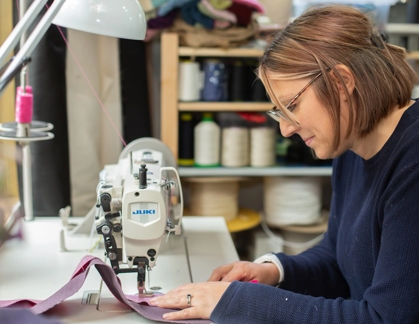 Kate using sewing machine