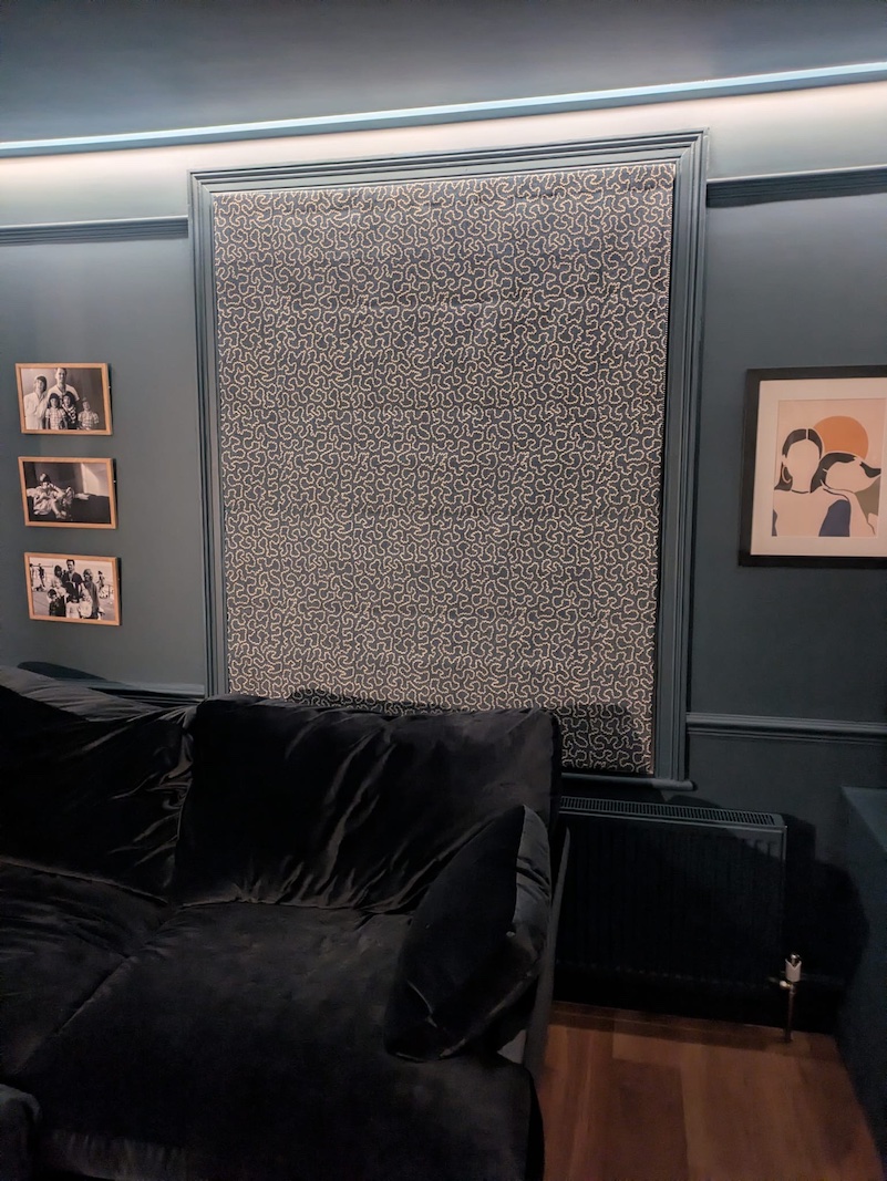 Stylish WIGGLE ROMAN BLIND featuring an intricate pattern, perfect for enhancing any modern interior space.